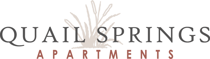 the logo for quail springs apartments